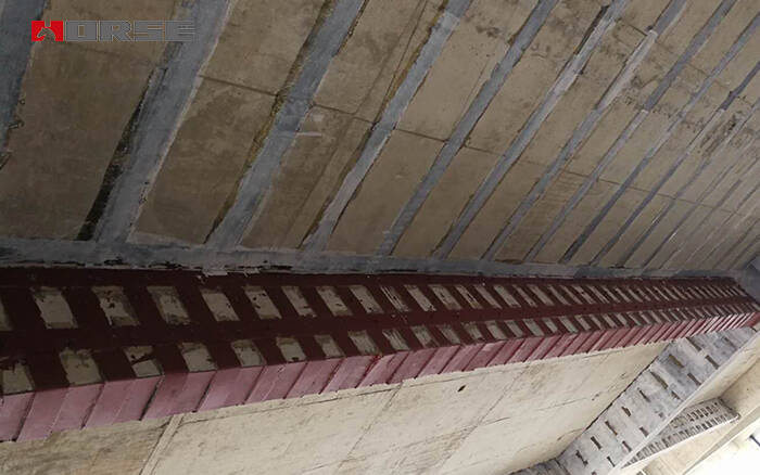 Reinforcement of building beams by adhesive bonded steel plate Reinforcement of building beams by adhesive bonded steel plate
