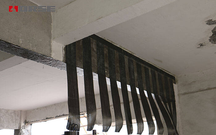 Reinforcement of frame beam with unidirectional carbon fiber fabric Reinforcement of frame beam with unidirectional carbon fiber fabric