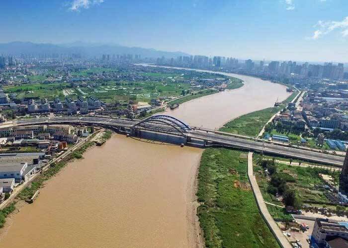 Maintenance and reinforcement of Longgang Bridge with CFRP