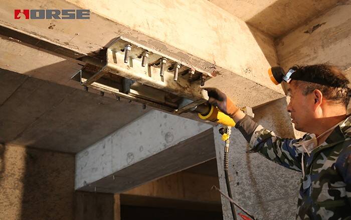 Prestressed CFRP Laminate To Reinforce The Underground Parking Lot