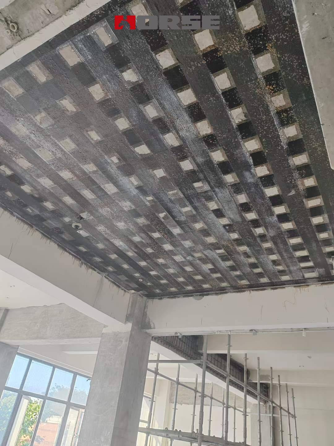 Seismic Reinforcement of a R.C. School Building Structure with Carbon Fiber