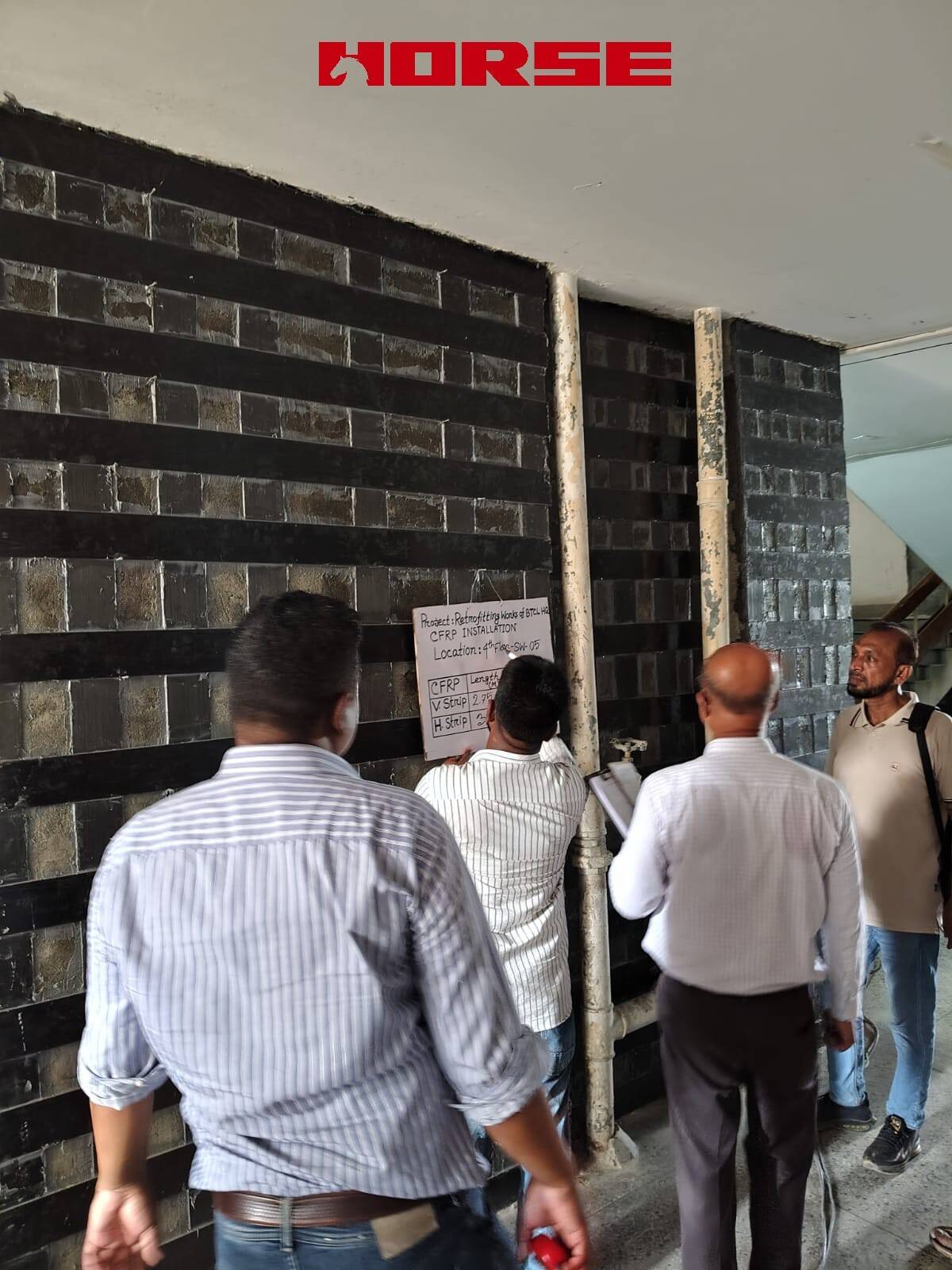 Retrofitting Concrete Walls Using CFRP Laminate